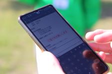 昨年度の訓練での『どこシル伝言板』の読み取り体験の様子です。